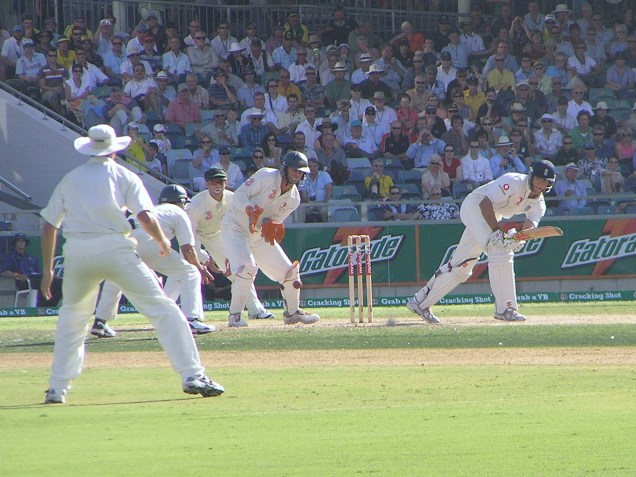 Cook pushes a single to complete his century against Australia in Perth 2006. Taken by this 